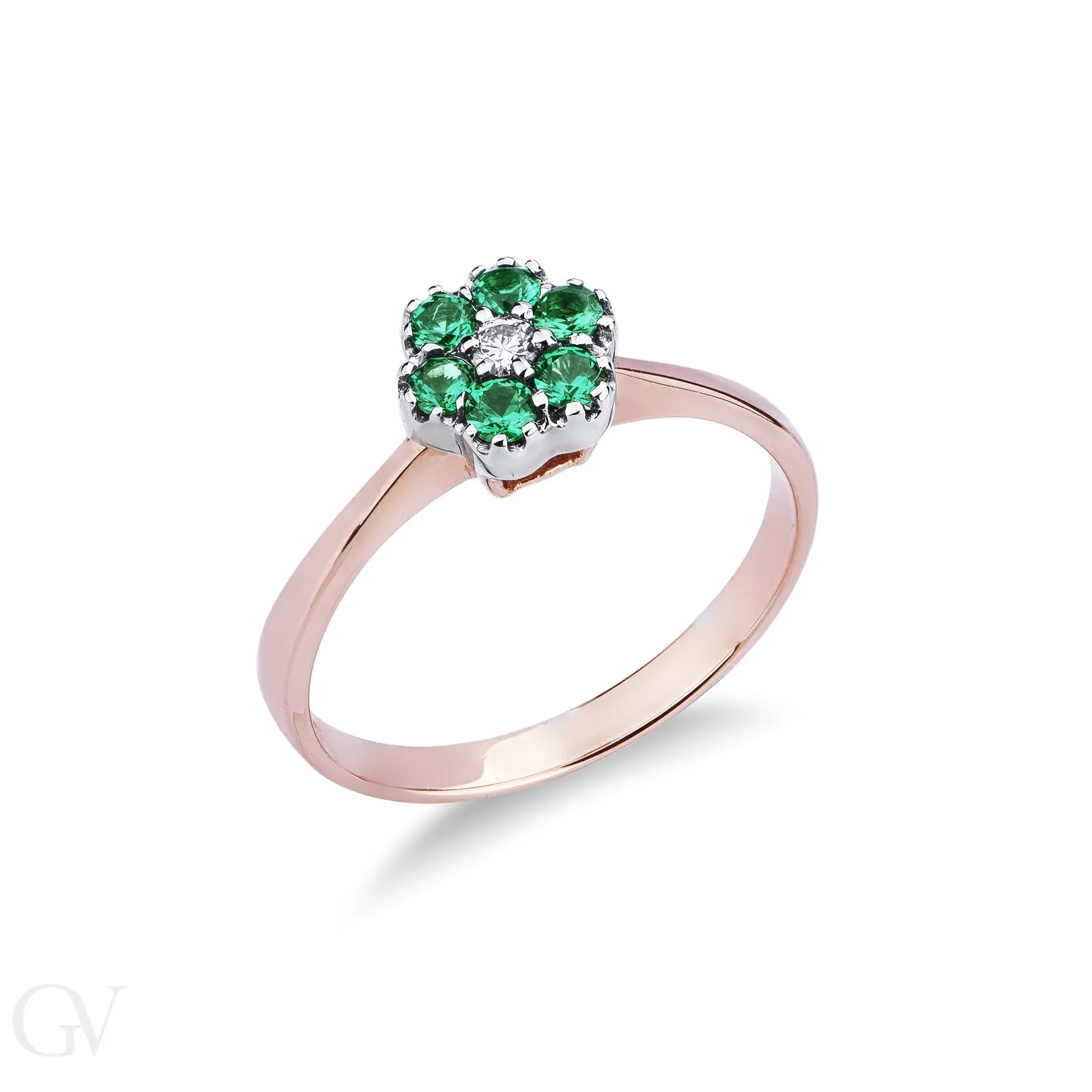 Anello in oro rosa e bianco 18k con fiorellino in smeraldi e diamante.