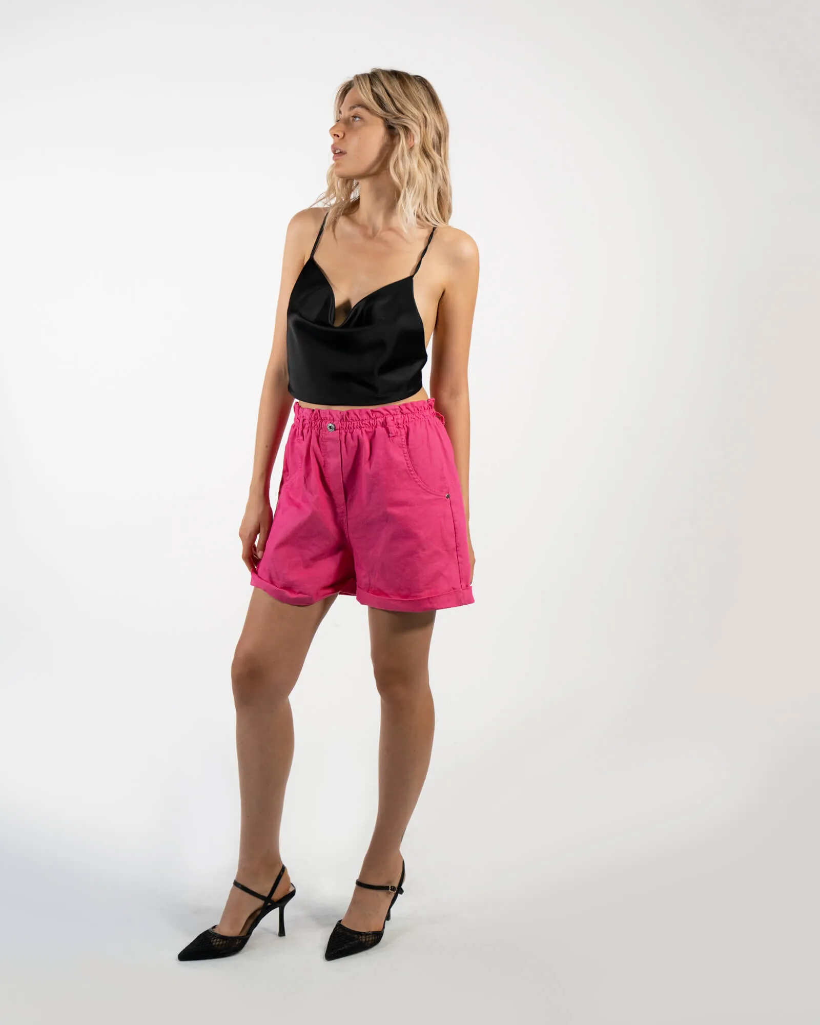 Shorts a caramella fucsia con cintura applicata.